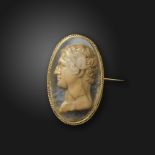 A French early 19th century sardonyx cameo brooch, the cameo depicting a gentleman in profile, in