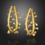 A pair of diamond-set hoop earrings, the hinged hoops with diamond-set egg-shaped tassels in brushed