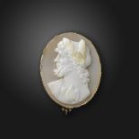 A 19th century shell cameo brooch, depicting Zeus in profile and set in gold, 3.3cm wide