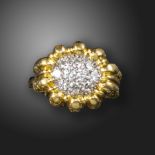 A diamond-set gold dress ring, c.1970, pavé-set with round brilliant-cut diamonds in a textured