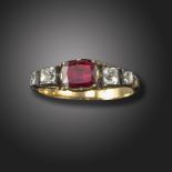 A George III garnet and rock crystal five-stone ring, the flat garnet with cushion-shaped rock