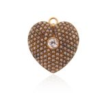 A late Victorian diamond and seed pearl heart brooch pendant, the gold heart pavé-set with seed