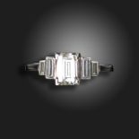 A diamond five-stone ring, centred with a baguette-shaped diamond weighing approximately 1.10cts,