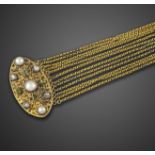 A Regency gold collar necklace, the lozenge-shaped panel set with pearls, emeralds and diamonds in