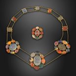 A gold necklace set with early 17th century hardstone intaglios, formed with three clusters set with