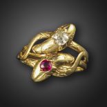 A gem-set gold double snake ring, set with an old cushion-shaped diamond and a circular-cut