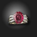 A pink spinel and diamond ring, the oval-shaped pink spinel is set with baguette-shaped shoulder