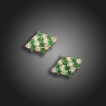 A pair of emerald and diamond set cufflinks by Larry, each lozenge-shaped link set with circular-cut