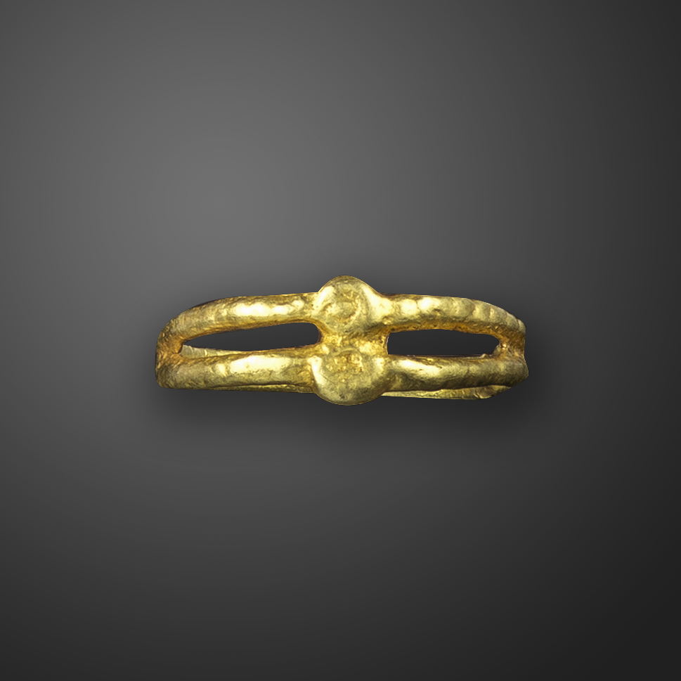 An Ostrogothic gold ring, c.5th-6th century AD, with circular central motif with bifurcated