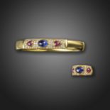 A sapphire, ruby and diamond-set gold bangle, set with cabochon sapphires, rubies and pave-set
