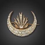 A Victorian closed crescent brooch, set with graduated old cushion-shaped diamonds in gold, with a