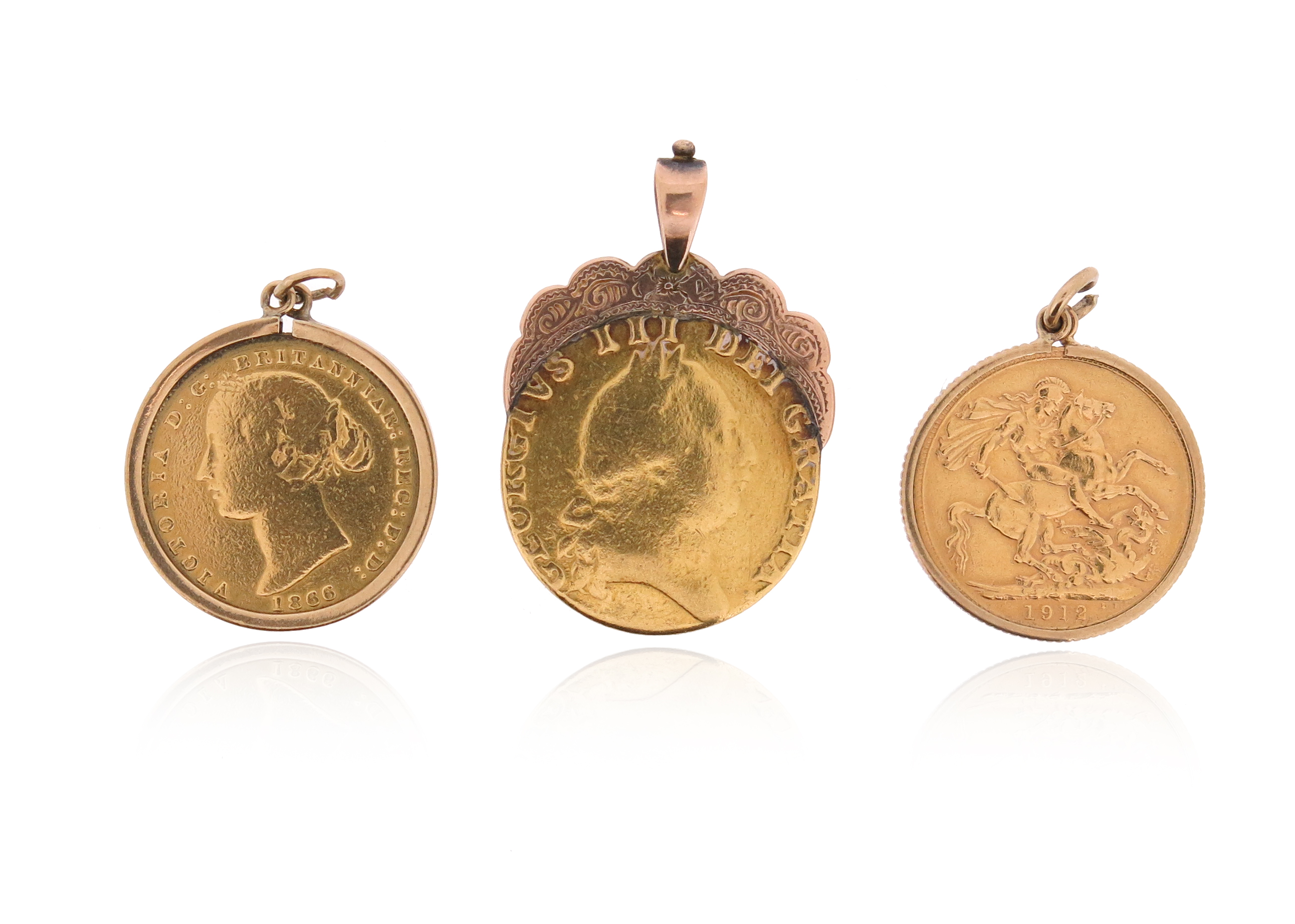 Three gold coin pendants, an 1866 Sydney Mint Sovereign, a 1912 sovereign and a Spade Guinea, all