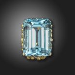 A large aquamarine and diamond ring in the style of Julius Cohen, the emerald-cut aquamarine