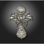 A late 18th century diamond pendant, the circular cluster suspends a diamond-set spray and a further