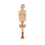 λ A Regency ivory desk seal, the carved ivory seal depicting the bust of Pan with fruiting vine, the