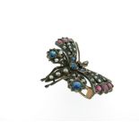 A 19th century gem-set butterfly brooch pendant, set with old cushion-shaped rubies and sapphires,