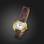 A lady's gold Ellipse wristwatch by Cartier, the signed white dial with black Roman numerals, signed