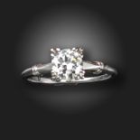 A diamond solitaire ring, the old circular-cut diamond weighs approximately 0.95cts, claw-set in