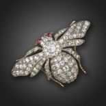 A Victorian diamond-set bee brooch, centred with an old circular-cut diamond weighing