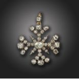 A George III diamond brooch pendant, the cruciform set with a central old pear-shaped diamond and