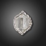 A rock crystal and diamond ring by Geoffrey Rowlandson, the lozenge-shaped rock crystal with