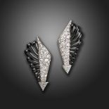 A pair of late Art Deco onyx and diamond arrow earrings, the carved black onyx adjacent to pave-