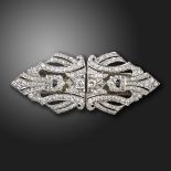 A diamond-set double clip brooch, set with graduated old circular, baguette and square-shaped