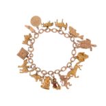 A gold charm bracelet, set with sixteen assorted gold charms, 55g total