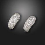 A pair of diamond bombé earrings, pavé-set with round brilliant-cut diamonds in platinum, diamonds