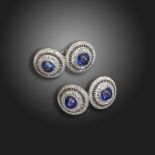 A pair of French sapphire and diamond-set platinum cufflinks, the circular links each centred with a