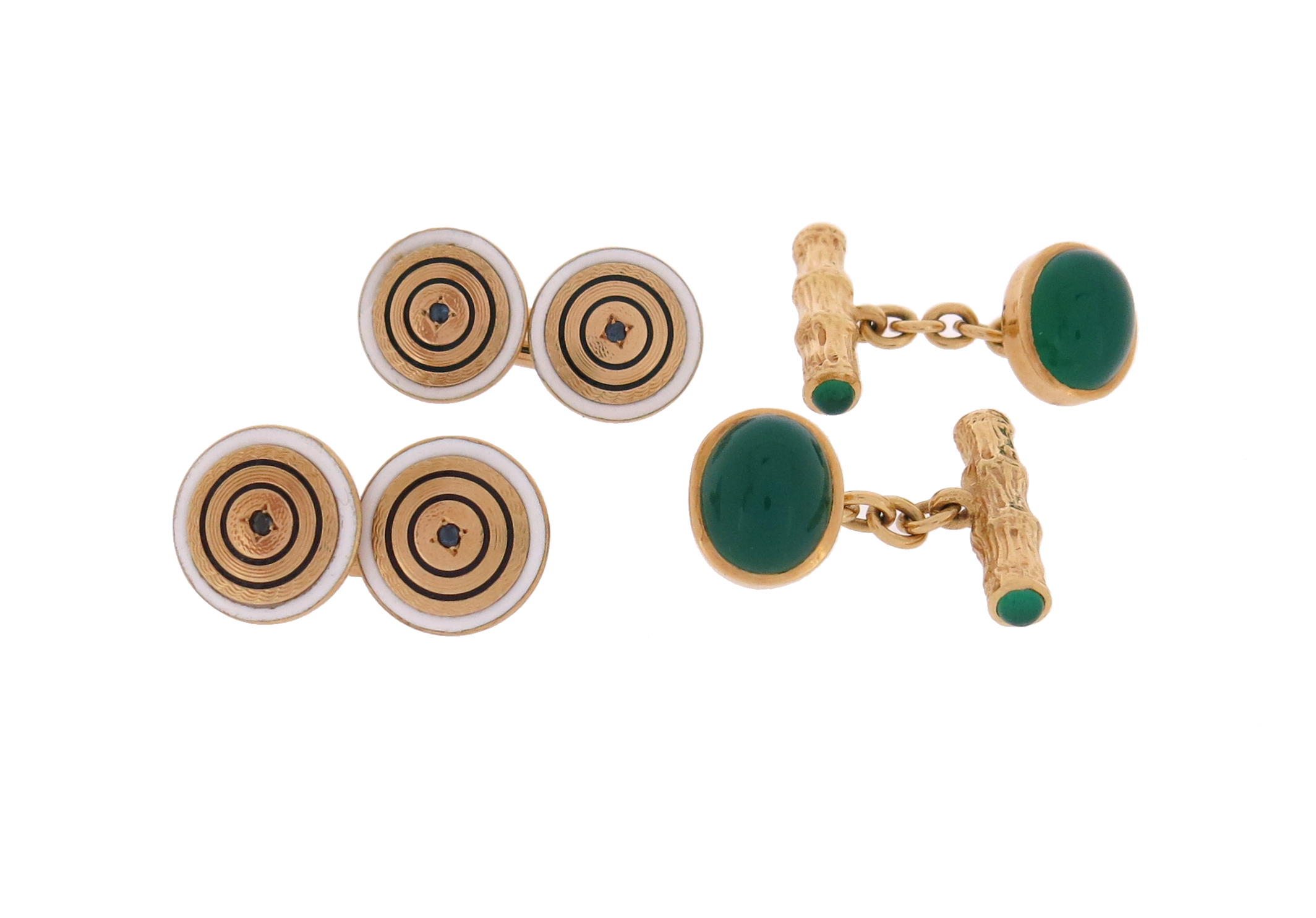 A pair of chrysoprase and gold cufflinks, the stylised wood design with chrysoprase cabochon