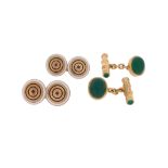 A pair of chrysoprase and gold cufflinks, the stylised wood design with chrysoprase cabochon