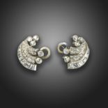 A pair of diamond-set scroll earrings, c.1940, set with baguette, square and circular-cut diamonds