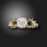 An old cushion-shaped diamond-set three-stone ring mount, set with one old cushion-shaped diamond