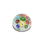 A Baccarat spaced millefiori paperweight dated 1848, set with thirteen individual canes including