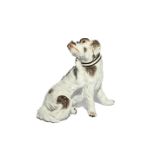 A Meissen figure of a Bolognese terrier c.1770, scratching itself under the chin with its rear