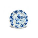 A rare Glasgow delftware plate c.1760, painted in blue with a boat at sail before a small