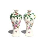 A pair of London-decorated Chinese soft-paste porcelain vases 18th century, the slender quatrefoil