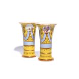 A pair of Paris porcelain vases 19th century, of flared form, painted with circular panels of