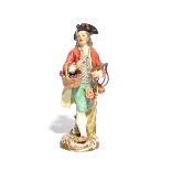 A Meissen Cris de Paris figure of a grape seller 19th century, after the model by Peter Reinicke,