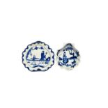 A Bow blue and white dish c.1755-60, painted with the Golfer and Caddy pattern of a young boy