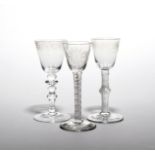 Three small wine glasses mid 18th century, one of possible Jacobite relevance, with a round funnel