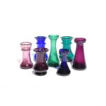 Seven small glass hyacinth or other bulb vases 19th/early 20th century, of churn and baluster