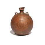 A pottery costrel or pilgrim flask probably medieval 14th-16th century, of rounded form with light