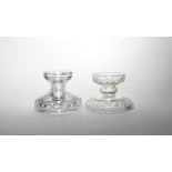 Two cut glass pineapple stands early 19th century, with wide feet, cut with diamond bands and