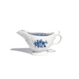 An Isleworth blue and white sauceboat c.1768-75, moulded with a dense floral design and painted with