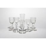 Six wine glasses c.1760-70, a pair with light moulding beneath a polished garland border, another