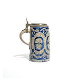 A Westerwald stoneware tankard 18th century, the cylindrical form applied and incised with a