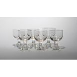 Six glass rummers 19th century, with generous rounded bowls raised on short stems and square lemon