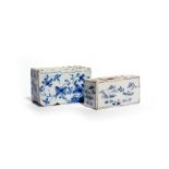 Two small delftware flower bricks c.1740-50, both decorated in blue with loose flowering plants, the